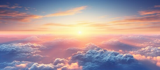 Aircraft viewpoint above clouds displaying breathtaking sunset Copy space image Place for adding text or design - obrazy, fototapety, plakaty