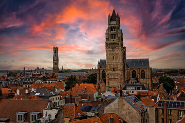 Fototapeta premium Medieval Town Bruges old city in Flanders in Belgium Europe. Art and culture. Tourists from the world. Ancient medieval architecture gothic with towers buildings, canals, cobbled alleyways horses