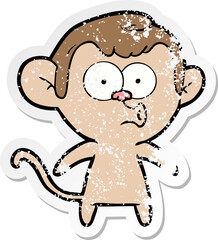 distressed sticker of a cartoon hooting monkey