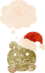 cute cartoon christmas bear with thought bubble in grunge distressed retro textured style