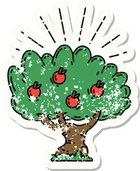 worn old sticker of a tattoo style apple tree
