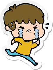 Obraz premium sticker of a cartoon boy crying