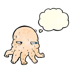 cartoon alien face with thought bubble