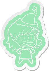quirky cartoon  sticker of a shocked elf girl wearing santa hat
