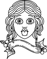 traditional black linework tattoo with banner of female face sticking out tongue