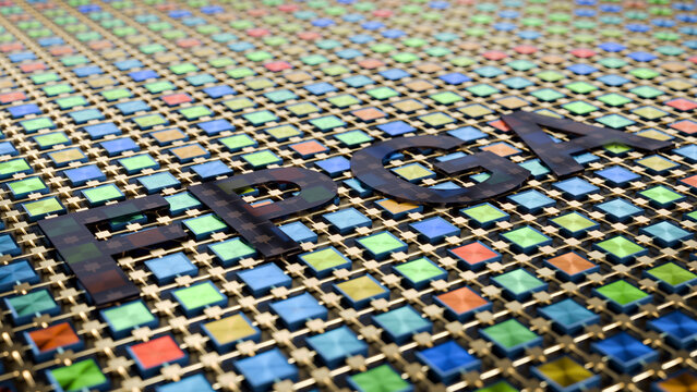 3d illustration of FPGA logic with the letters "FPGA" embedded into them. FPGA is the commonly used acronym for Field Programmable Gate Array.