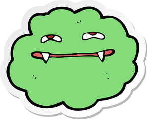 sticker of a cartoon vampire cloud