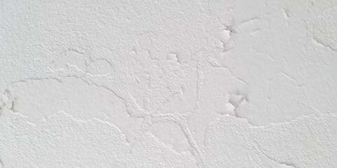 Beautiful white cement wall plastered surface background pattern. Clean white wall advertising backdrop. Concrete white wall. Seamless cracked off white stone smooth wall texture.	
