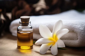 Poster Spa composition with vanilla flower essential oil, zen stones and towels © pilipphoto