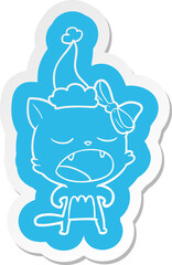 quirky cartoon  sticker of a cat meowing wearing santa hat