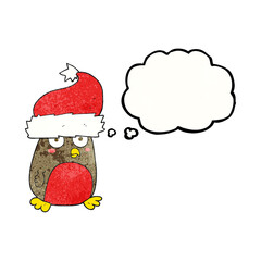 freehand drawn thought bubble textured cartoon christmas robin wearing christmas hat