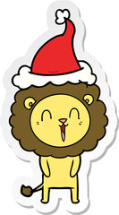 laughing lion hand drawn sticker cartoon of a wearing santa hat
