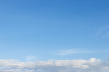 Sky with white clouds, blue space for letters. natural background and texture.