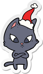 confused hand drawn sticker cartoon of a cat wearing santa hat