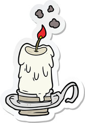 sticker of a cartoon spooky candle