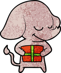 cartoon smiling elephant with present