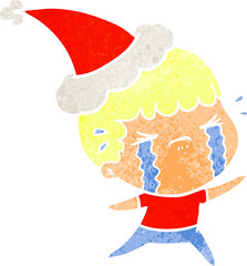 hand drawn retro cartoon of a man crying wearing santa hat