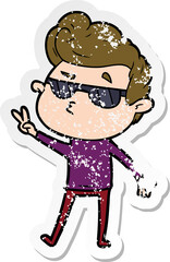 Obraz premium distressed sticker of a cartoon cool guy