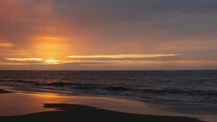 Sunset on the lonely beach of Zorritos province in Piura Peru
