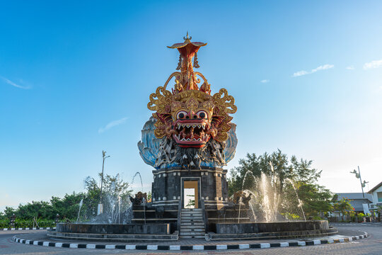 The splendor of the 23 meter tall Be Barong or Barong Fish statue which is the icon of the Bali Maritime Tourism Hub at Benoa Harbor, Bali Indonesia
