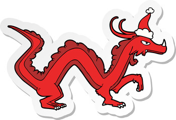 hand drawn sticker cartoon of a dragon wearing santa hat