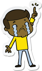 sticker of a cartoon man crying