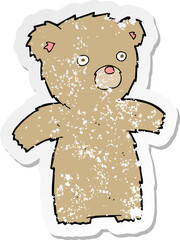 retro distressed sticker of a cartoon teddy bear