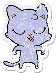 distressed sticker of a cartoon cat