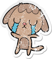 distressed sticker of a cute cartoon dog crying