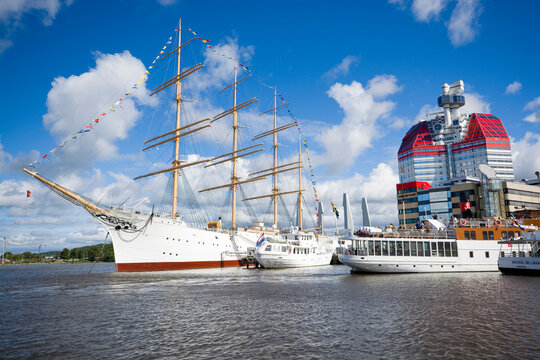 Hotel Barken Viking on old historic sailing ship in Goteborg, Sweden. Characteristic Skanskaskrapan building on the right.
