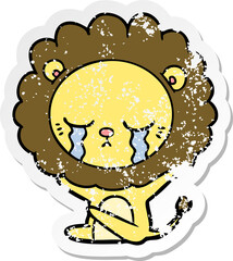 distressed sticker of a crying cartoon lion
