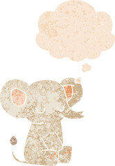 cartoon elephant with thought bubble in grunge distressed retro textured style