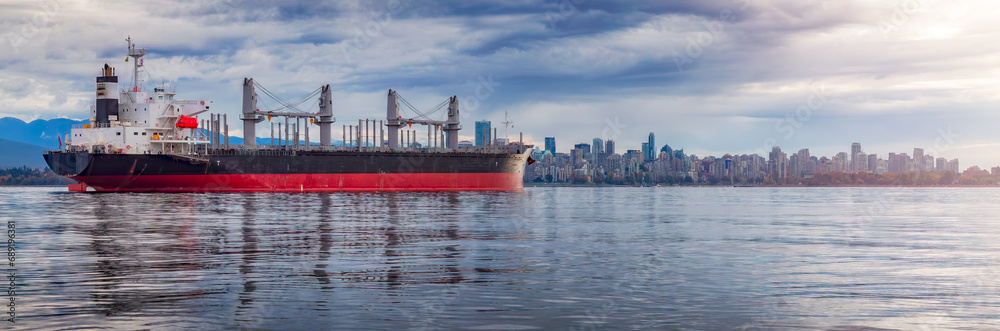 Wall mural container ship in burrard inlet with downtown city in background. vancouver, bc, canada