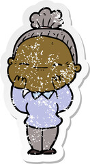 distressed sticker of a cartoon peaceful old woman