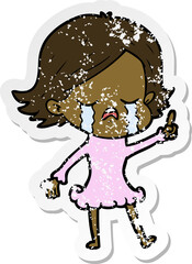 distressed sticker of a cartoon girl crying