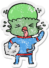 distressed sticker of a weird cartoon alien