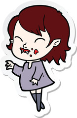 sticker of a cartoon vampire girl with blood on cheek