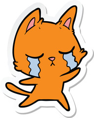 sticker of a crying cartoon cat