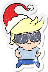 hand drawn christmas distressed sticker cartoon of kawaii boy