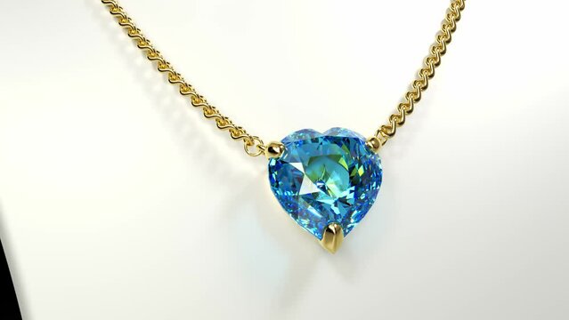 Gold necklace with blue gemstone in heart shape on jewelry bust. 3d animation