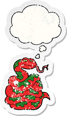 cartoon snake with thought bubble as a distressed worn sticker