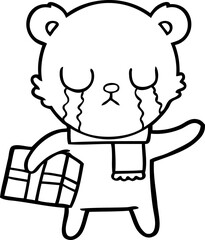 Obraz premium crying polar bear cartoon with christmas gift
