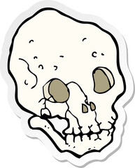 sticker of a cartoon spooky skull