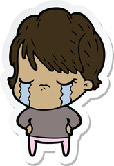 sticker of a cartoon woman crying