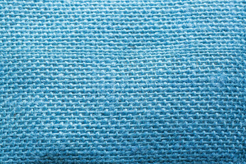 blue macro fabric,Background from blue fabric in folds. The texture of the fabric. blue fabric cloth background texture .