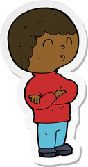 sticker of a cartoon boy with folded arms