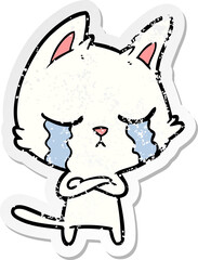 distressed sticker of a crying cartoon cat