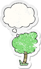 cartoon tree with thought bubble as a distressed worn sticker