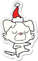 hand drawn sticker cartoon of a dog wearing santa hat