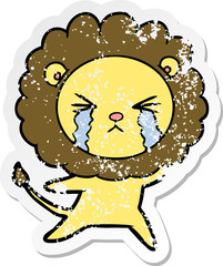 distressed sticker of a cartoon crying lion